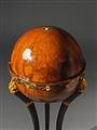 An inlaid walnut globe table. - image-5