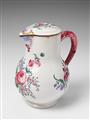 A Strasbourg faience pitcher with overglaze floral decor. - image-1
