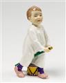 A Meissen porcelain figure of a child riding on a hobby horse. - image-1