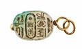 A gold pendant with an ancient faience scarab. - image-1