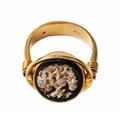 An 18k gold twisting ring with a Roman cameo. - image-2