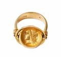 An 18k gold twisting ring with a Roman cameo. - image-1