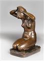 A bronze sculpture of a girl tying her hair - image-2
