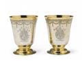An important pair of Augsburg silver gilt abbot's beakers - image-1