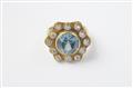 An 18k gold ring with a blue zircon - image-1