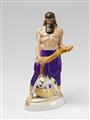 A Berlin KPM porcelain figure of an Assyrian man with a dog - image-1