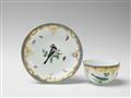 A Berlin KPM porcelain cup and saucer with bird and insect decor - image-1