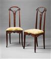 A pair of hardwood "aux clématites" chairs after Louis Majorelle - image-2
