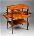A bronze-mounted Louis Majorelle mahogany and satinwood tea table - image-3