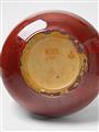 A large red feldspar glazed stoneware vase - image-2