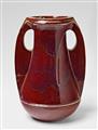 A large red feldspar glazed stoneware vase - image-1