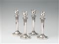 A set of four German silver candlesticks - image-1