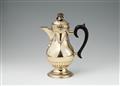 A large Neoclassical silver gilt coffee pot - image-1