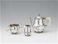 An Arts & Crafts silver tea service - image-4