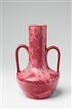 A two-handled ceramic vase with aquatic decor - image-1