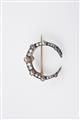 A Belle Epoque 14k gold and silver crescent moon brooch - image-1
