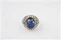 A 14k gold and sapphire ring - image-3