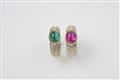 A pair of 18k gold and coloured stone eternity rings - image-1