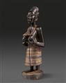 YORUBA FEMALE FIGURE By one of the master carvers of the Igbuke Carving House in Oyo - image-1