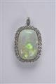 A 14k white gold and opal pendant - image-1
