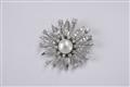 A 14k white gold and diamond brooch - image-1