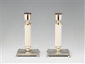 A pair of Art Deco silver and ivory candlesticks - image-1