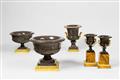 A rare set of five ormolu-mounted carved porphyry krater vases - image-1