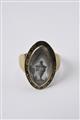 A George III 14k gold ring with a hairwork miniature - image-1