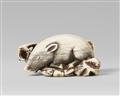 A good Kyoto school ivory netsuke of a recumbent boar on a bed of leaves. Late 18th century - image-1