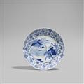 A blue and white "hunt" dish. Kangxi period (1662-1722) - image-1
