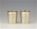 A pair of Augsburg silver gilt snakeskin beakers - image-1