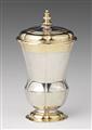 A parcel gilt Dresden silver beaker and cover - image-1
