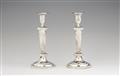 A pair of Reval silver candlesticks - image-1