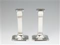 A pair of Art Deco Tiffany silver candlesticks - image-1