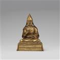 A Sinotibetan gilt bronze figure of a Gelugpa lama. 18th century - image-1