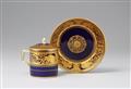 A Meissen porcelain cup and cover with gold lions - image-1