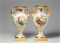 A pair of Berlin KPM porcelain amphora vases with floral decor - image-1