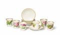 A set of six Berlin KPM porcelain cups and saucers with floral decor - image-1