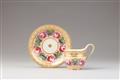 A Berlin KPM porcelain cup and saucer with roses and forget-me-nots - image-1