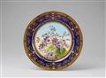 A Sèvres porcelain plate with naturalistic flowers - image-1