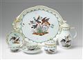 Pieces from a Berlin KPM porcelain tea service with native Continental birds - image-1