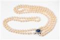 An 18k white gold and pearl necklace with a sapphire clasp - image-1