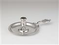 A George I silver chamberstick - image-1