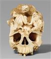 A walrus tusk okimono of a skull. Late 19th century - image-2
