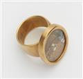 An 18k gold kinetic capsule ring - image-2
