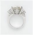 An 18k white gold ring with a diamond solitaire - image-2