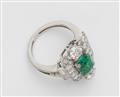 An 18k white gold, diamond, and emerald ring - image-2