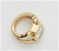 An 18k bi-colour gold ring with a diamond solitaire - image-2