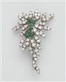 An 18k white gold, diamond, and emerald brooch - image-1