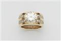 An 18k bi-colour gold and diamond ring - image-1